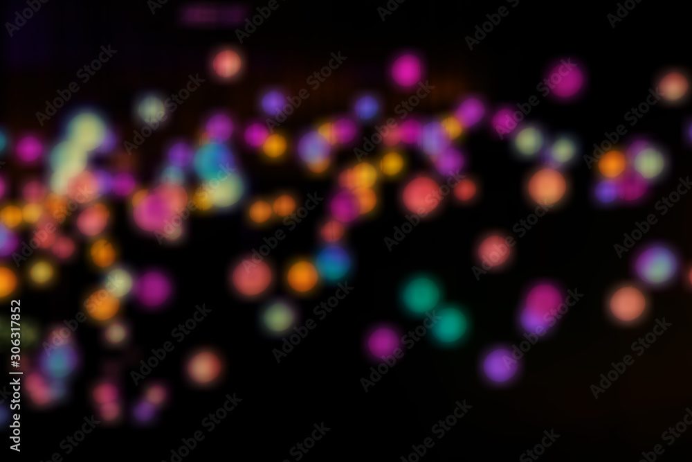 Naklejka premium Blurred colorful light abstract bokeh background.