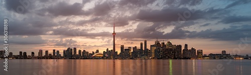 Photography Panoramic shot of the Toronto city in Canada with illuminated buildings during s