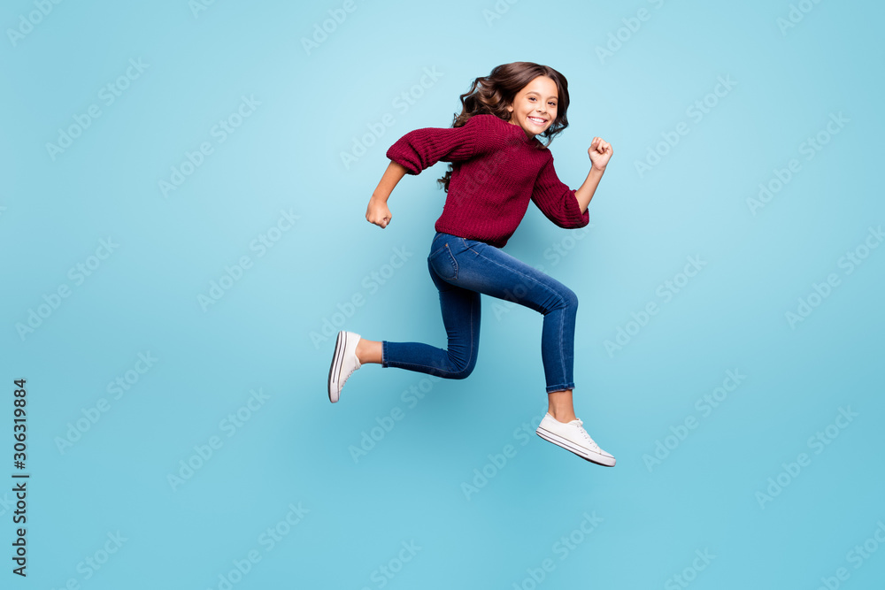 Full length body size side profile photo of wavy cheerful positive girl running towards shopping center footwear isolated over vibrant color blue background