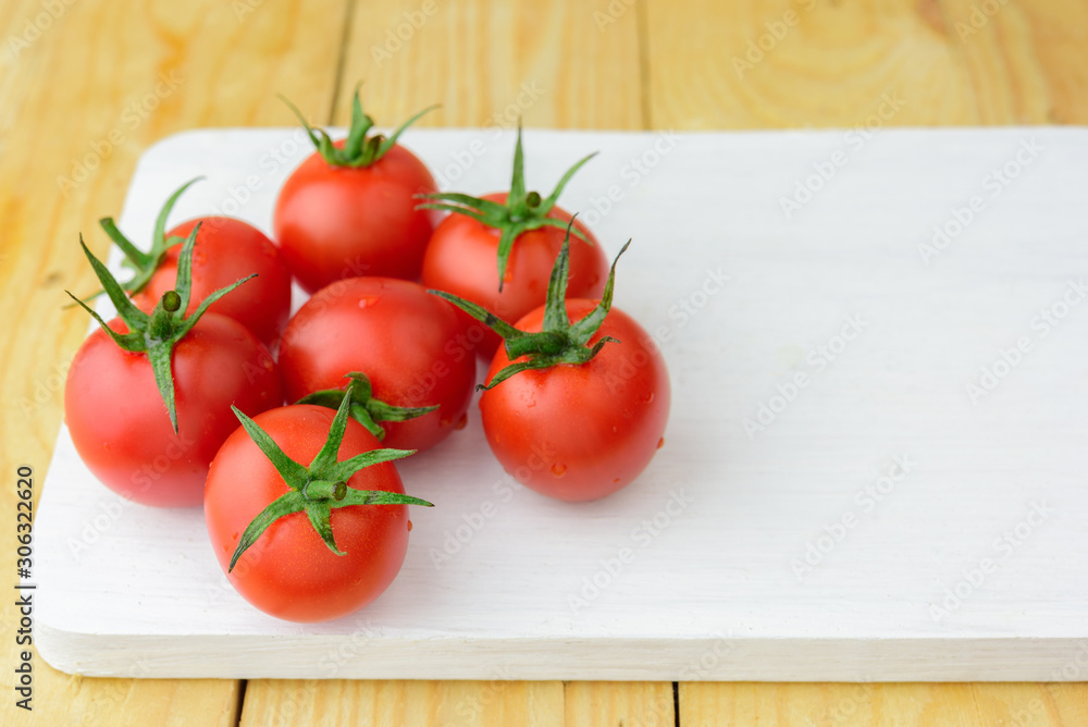 fresh tomato on wood background fresh tomato on wood background