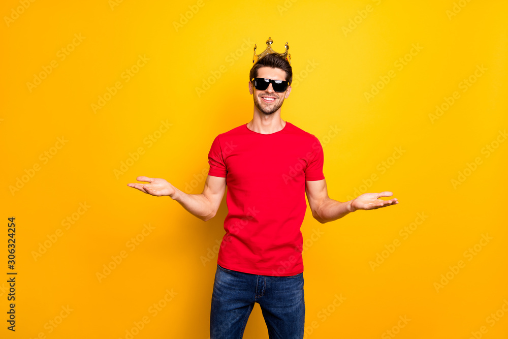 Portrait of cheerful charming cool guy real prom king hold hand want hug his friend celebrate his prom win coronation wear denim jeans outfit isolated over yellow color background Portrait of cheerful charming cool guy real prom king hold hand want hug his friend celebrate his prom win coronation wear denim jeans outfit isolated over yellow color background