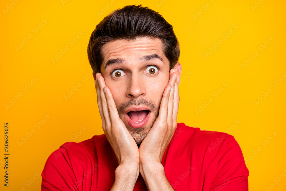 Close up photo of funky guy have made terrible mistake stare stupor scream omg palm touch cheeks feel impressed reaction wear good look outfit isolated over shine color background Close up photo of funky guy have made terrible mistake stare stupor scream omg palm touch cheeks feel impressed reaction wear good look outfit isolated over shine color background