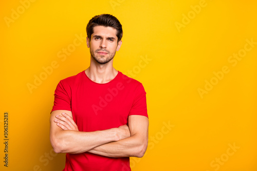 Portrait of serious focused start-up worker man cross hands ready decide decisions solution wear casual style clothing isolated over vibrant color background © deagreez