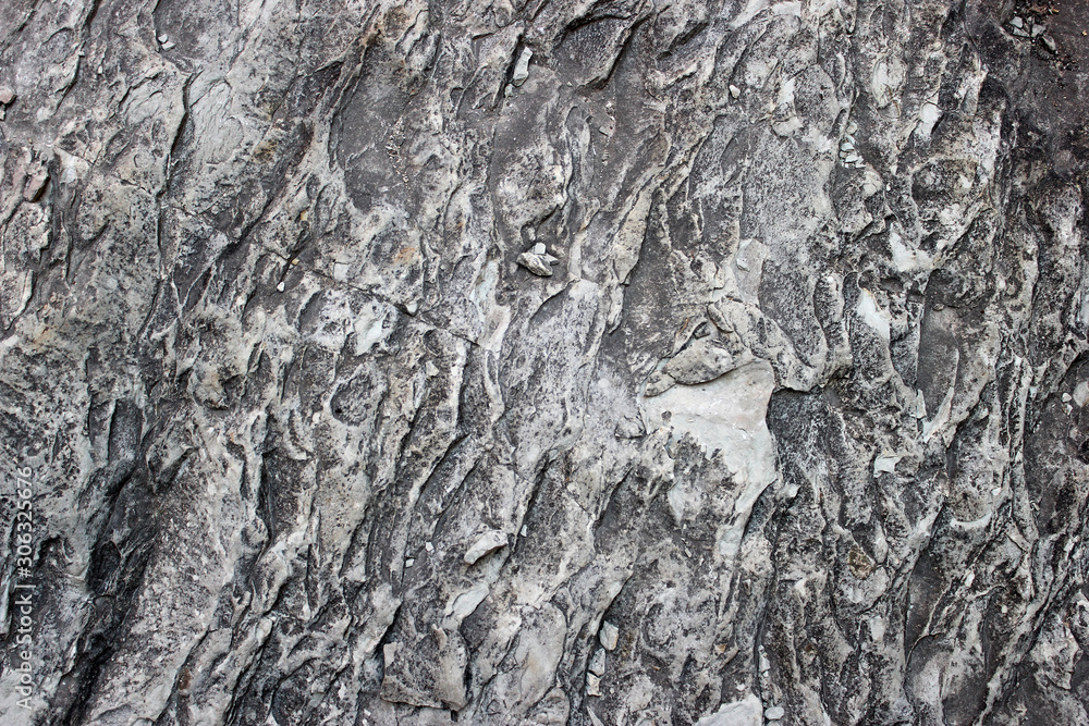 Volcanic rough stone dark wall background texture Volcanic rough stone dark wall background texture