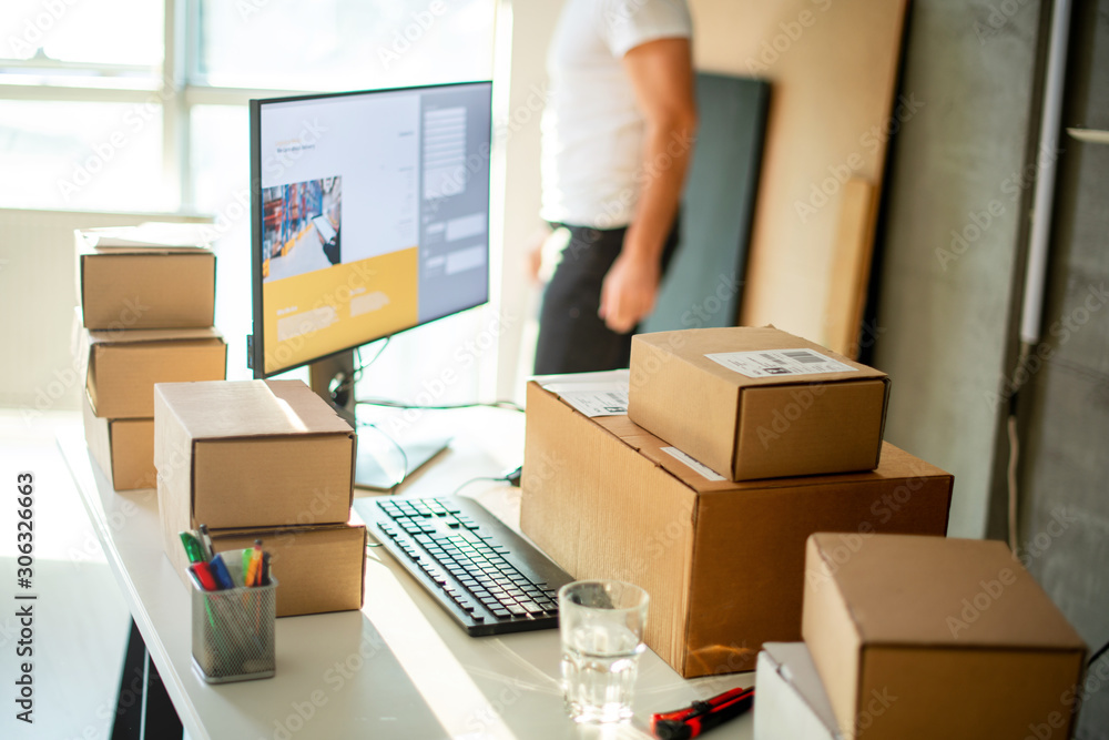 Delivery service, working in warehouse with packages	