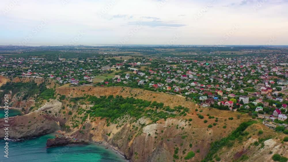 Aerial, tracking, drone shot, of a paradise beach, turquoise water and green jungle Aerial, tracking, drone shot, of a paradise beach, turquoise water and green jungle
