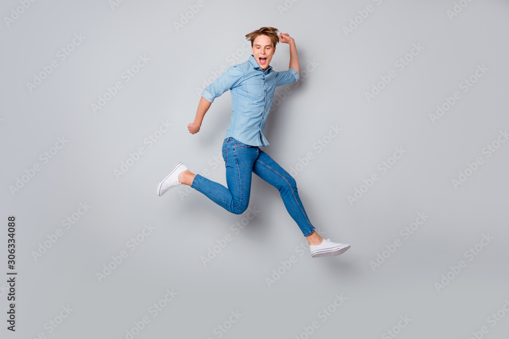 Full body photo of funky crazy guy have spring weekends feel careless imagine he teenager again wear casual style outfit sneakers isolated over grey color background