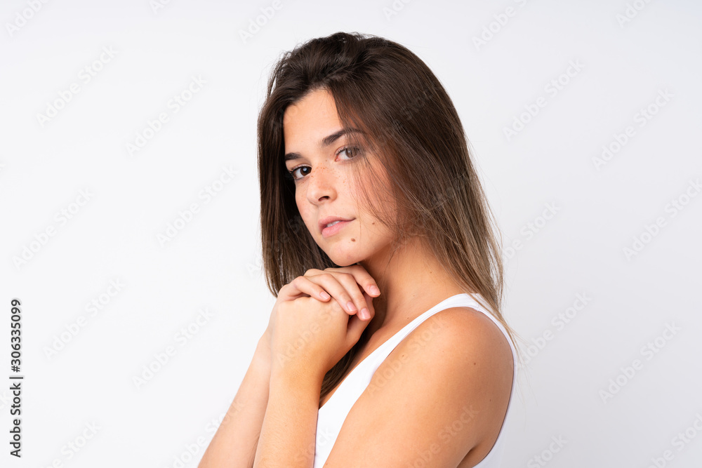 Portrait of pretty teenager Brazilian girl over isolated background Portrait of pretty teenager Brazilian girl over isolated background