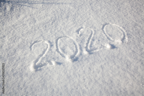 2020 date written on the white fresh snow.