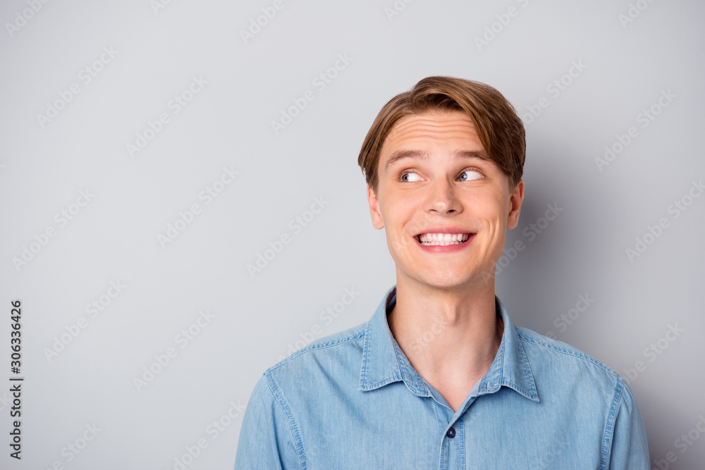Portrait of cheerful charming guy look copyspace see girl feel shy want acquaintance wear modern outfit isolated over grey color background Portrait of cheerful charming guy look copyspace see girl feel shy want acquaintance wear modern outfit isolated over grey color background