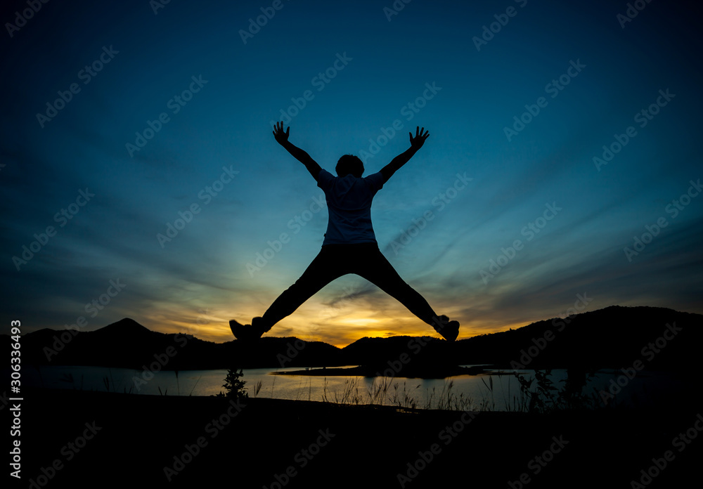 Silhouette of man the happy. Natural light, Golden evening light, last light.