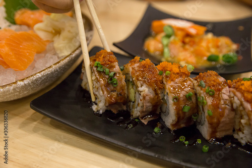 Top view of wagyu beef Original Japan sushi on black background, focus selective.