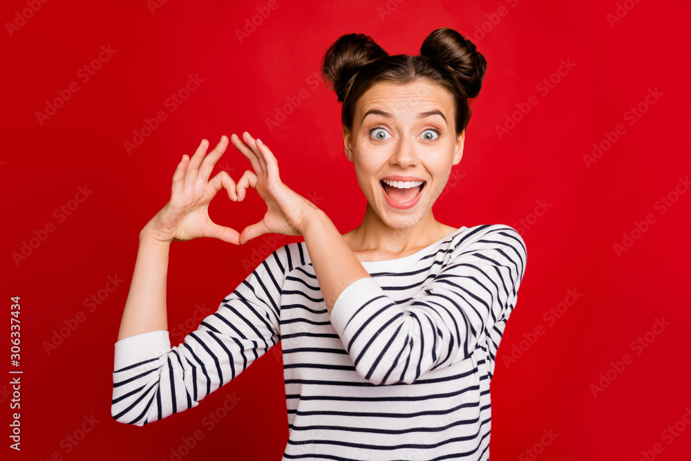 Portrait of impressed girl crazy girlfriend make fingers heart passionate love sign scream unbelievable unexpected wear white pullover isolated over red color background Portrait of impressed girl crazy girlfriend make fingers heart passionate love sign scream unbelievable unexpected wear white pullover isolated over red color background