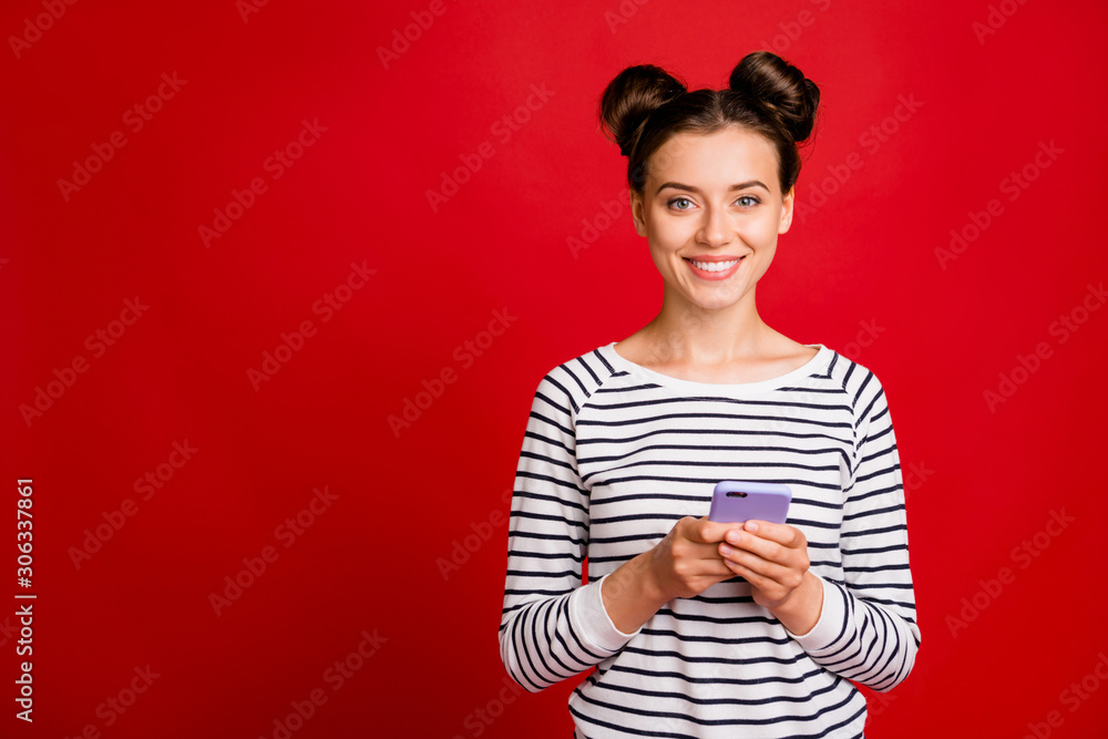 Positive cheerful girl blogger use smartphone enjoy social media blogging wear casual style white clothing isolated over red color background Positive cheerful girl blogger use smartphone enjoy social media blogging wear casual style white clothing isolated over red color background