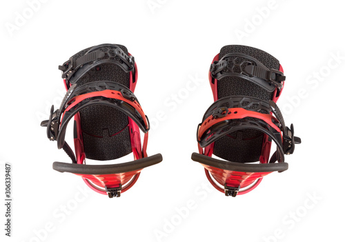 Top view of black and red snowboard bindings isolated on white background