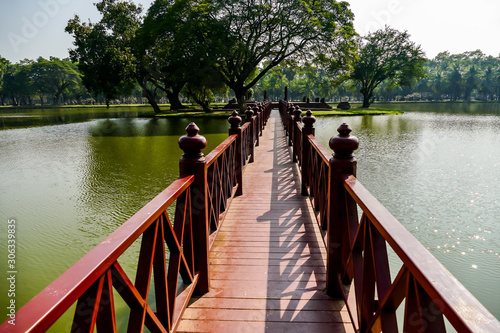 wooden bridge over river, digital photo picture as a background photo