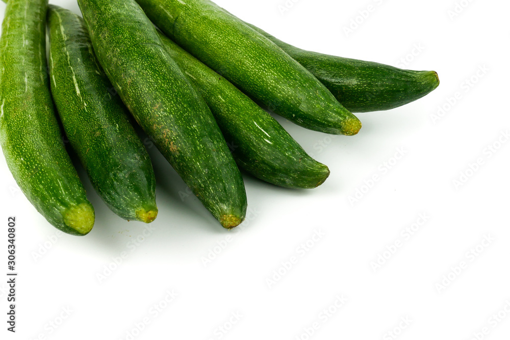 Snake gourd, Serpent gourd, Chichinda, Trichosanthes anguina Linn or cucumerina Isolated on white background. food ingredient and Healthy food for slow down aging Snake gourd, Serpent gourd, Chichinda, Trichosanthes anguina Linn or cucumerina Isolated on white background. food ingredient and Healthy food for slow down aging