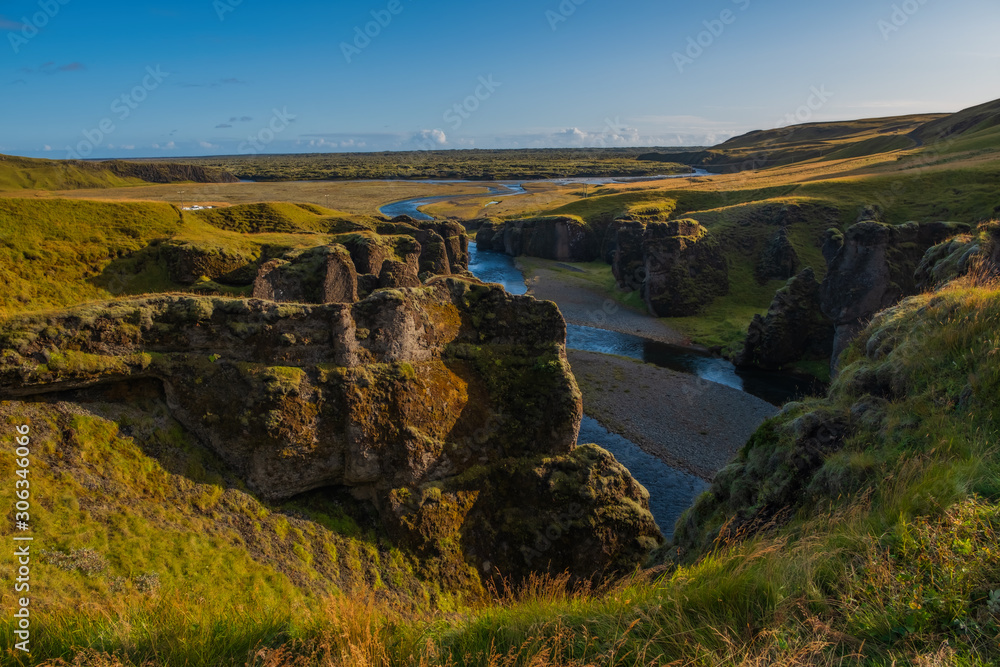 The most picturesque canyon Fjadrargljufur and the shallow creek, which flows along the bottom of the canyon. Fantastic country Iceland. September 2019.