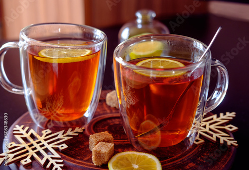 Thermo cup of black tea with lemon