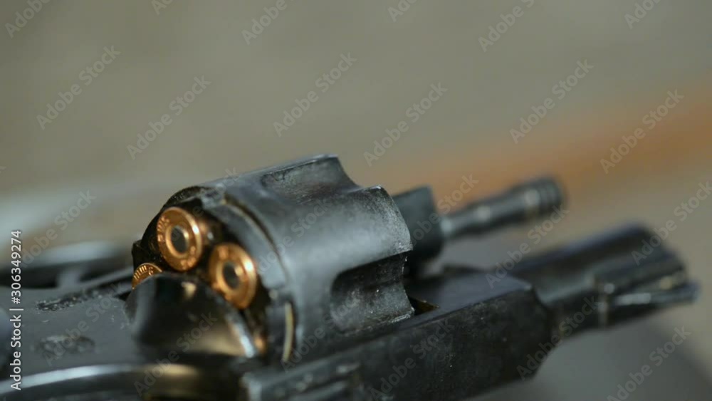 Detail of revolver and cartridges. Rotation. Detail of revolver and cartridges. Rotation.