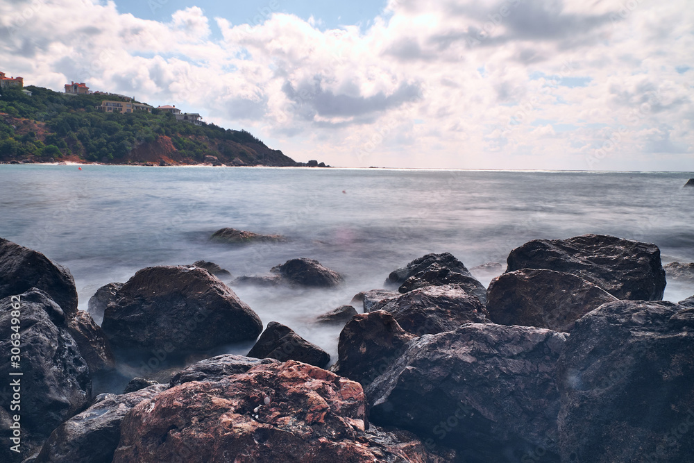 Long exposure photography of the sea waves moving in the rocks. Long exposure photography of the sea waves moving in the rocks.