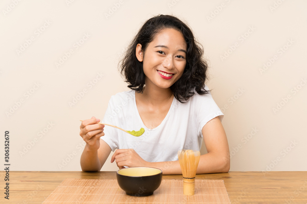 Young asian girl with tea matcha Young asian girl with tea matcha
