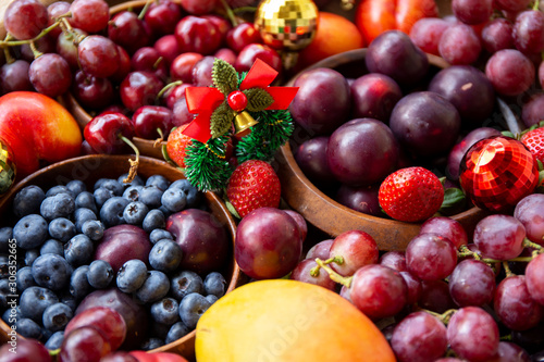 Fototapeta Naklejka Na Ścianę i Meble -  Christmas decoration with summer season fruits in Australia