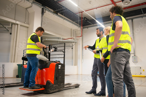 Training on a forklift, managers and workers