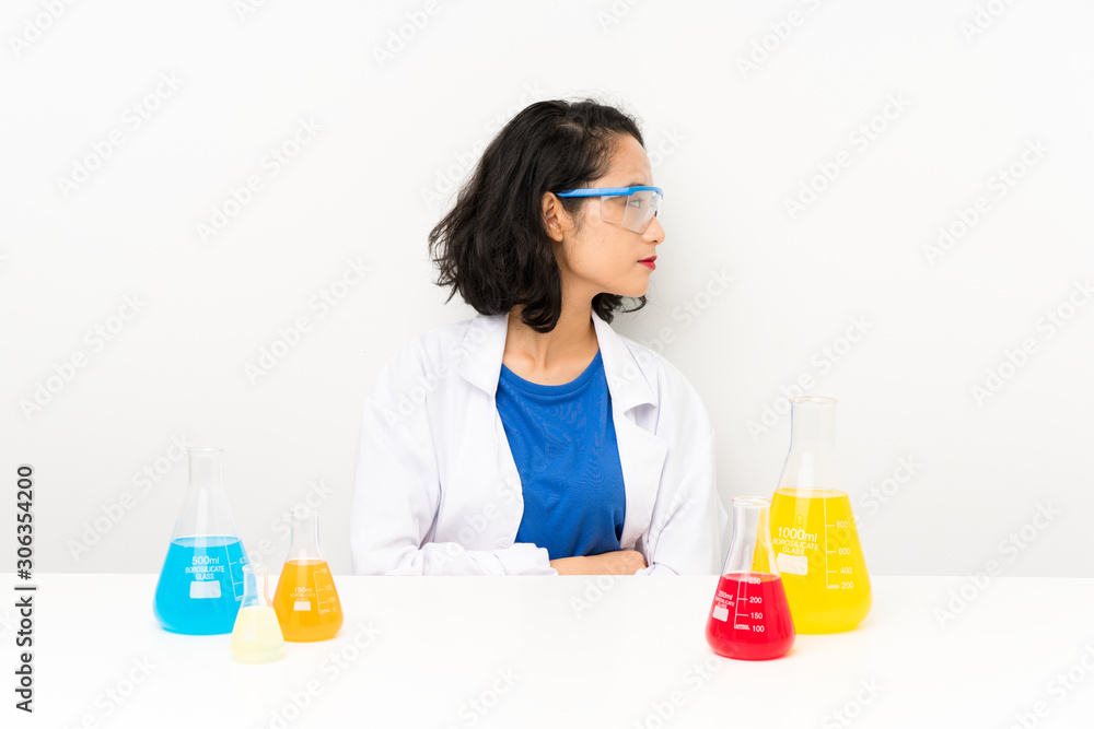 Young scientific asian girl looking side Young scientific asian girl looking side