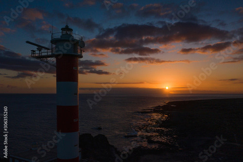 View from the height of the lighthouse silhouette Faro de Rasca at sunset on Tenerife  Canary Islands  Spain. Wild Coast of the Atlantic Ocean