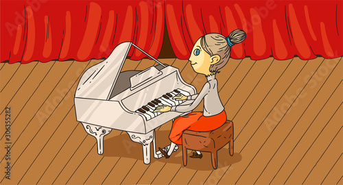 Female pianist performing on stage in concert hall