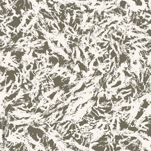 Urban camouflage of various shades of brown and beige colors