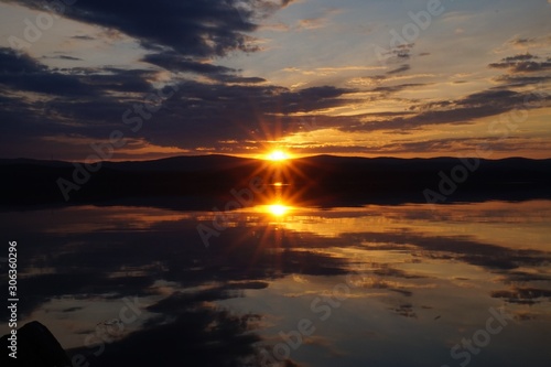 sunset on a lake © T