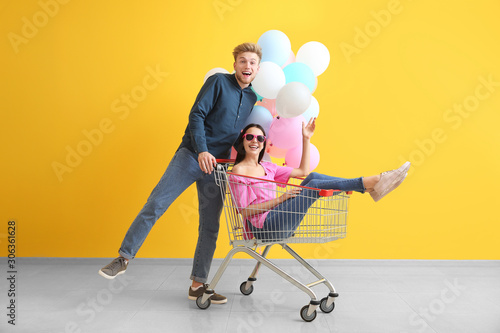 Young couple with shopping ...