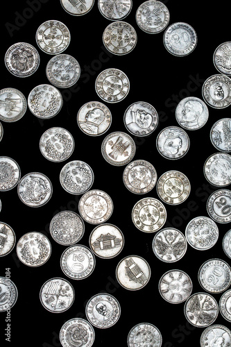 Close Up of Silver Chinese Coins Cash