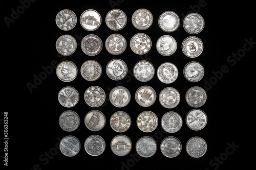 Close Up of Silver Chinese Coins Cash