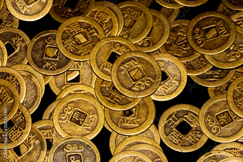 Close Up of Golden Chinese Coins Cash