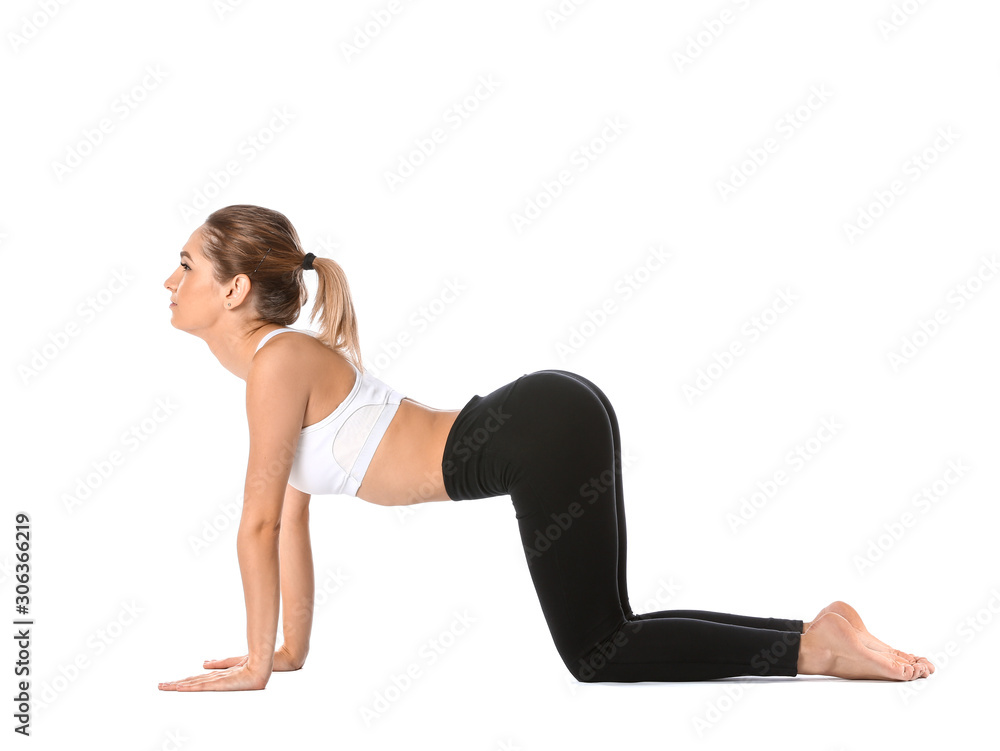 Beautiful young woman practicing yoga on white background Beautiful young woman practicing yoga on white background