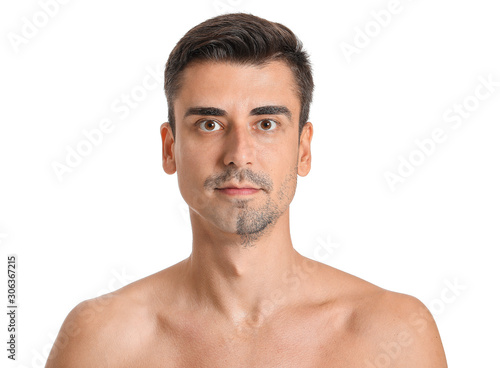 Handsome young man with shaved part of his face on white background