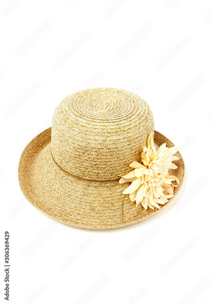 Straw hat in front of a white background. Straw hat in front of a white background.
