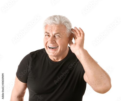 Mature man with hearing pro...