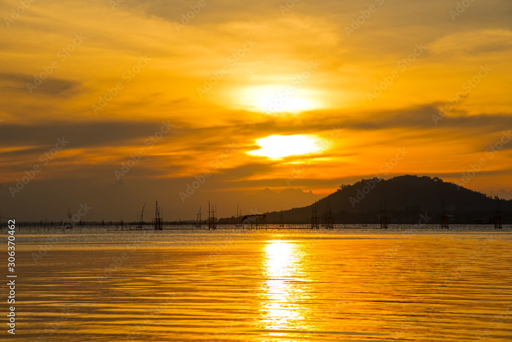 Local fishing boats fish in the sea, evening with beautiful light , Fishermen in Songkhla, Thailand