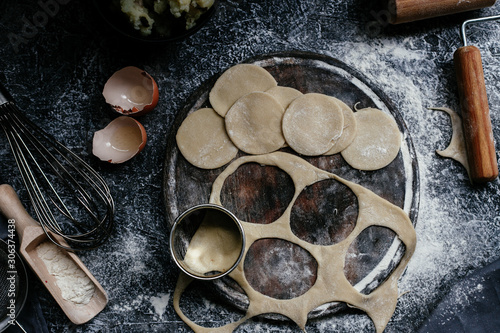 The process of making dumplings, pies in the kitchen photo