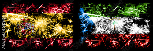 Spanish vs Equatorial Guinea New Year celebration sparkling fireworks flags concept background. Combination of two abstract states flags. © Vlad