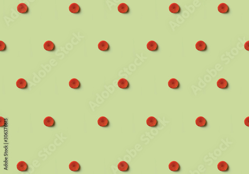 Carrot pattern isolated on green background. Vegetables.