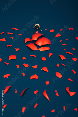 Broken red Christmas ornament