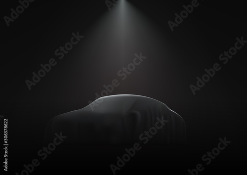 The Car Is Covered With Dark Cloth On Black