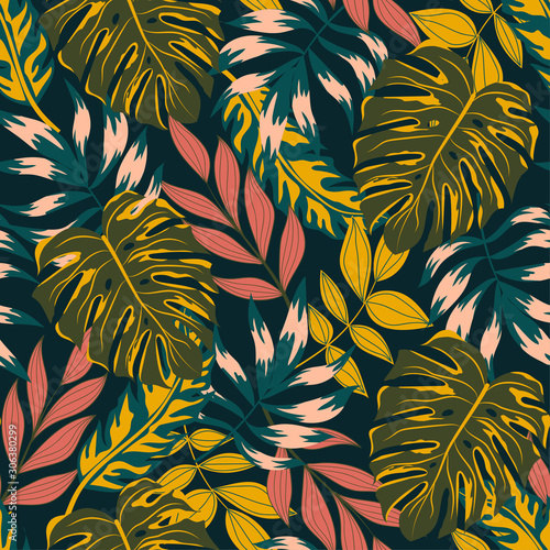 Trending abstract seamless pattern with tropical leaves and bright colors. Jungle seal. Vector design. The background floral. Textiles and printing. Exotic, tropical.