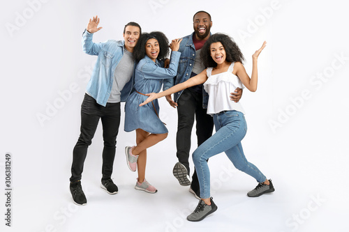 Portrait of young African-American people on white background