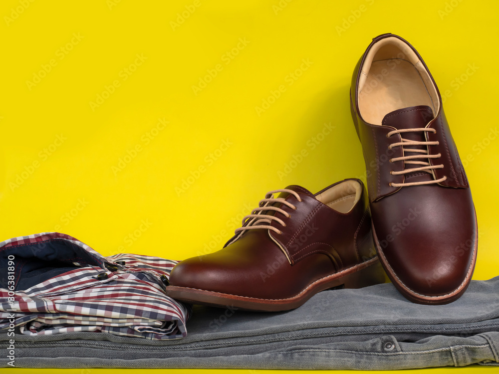Men Fashion Clothing Set And Brown Leather Shoes Isolated On A Yellow  Background. Business Man Clothes Concept. Stock Photo | Adobe Stock